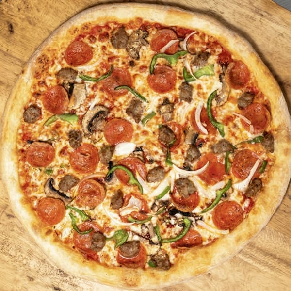 Uncle Vito's Pizzeria's whole pizza with pepperoni, sausage, mushrooms, onions, and green peppers.